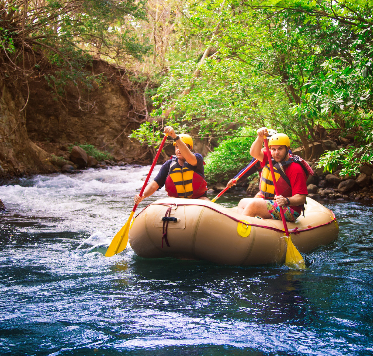 two men rafting on a river